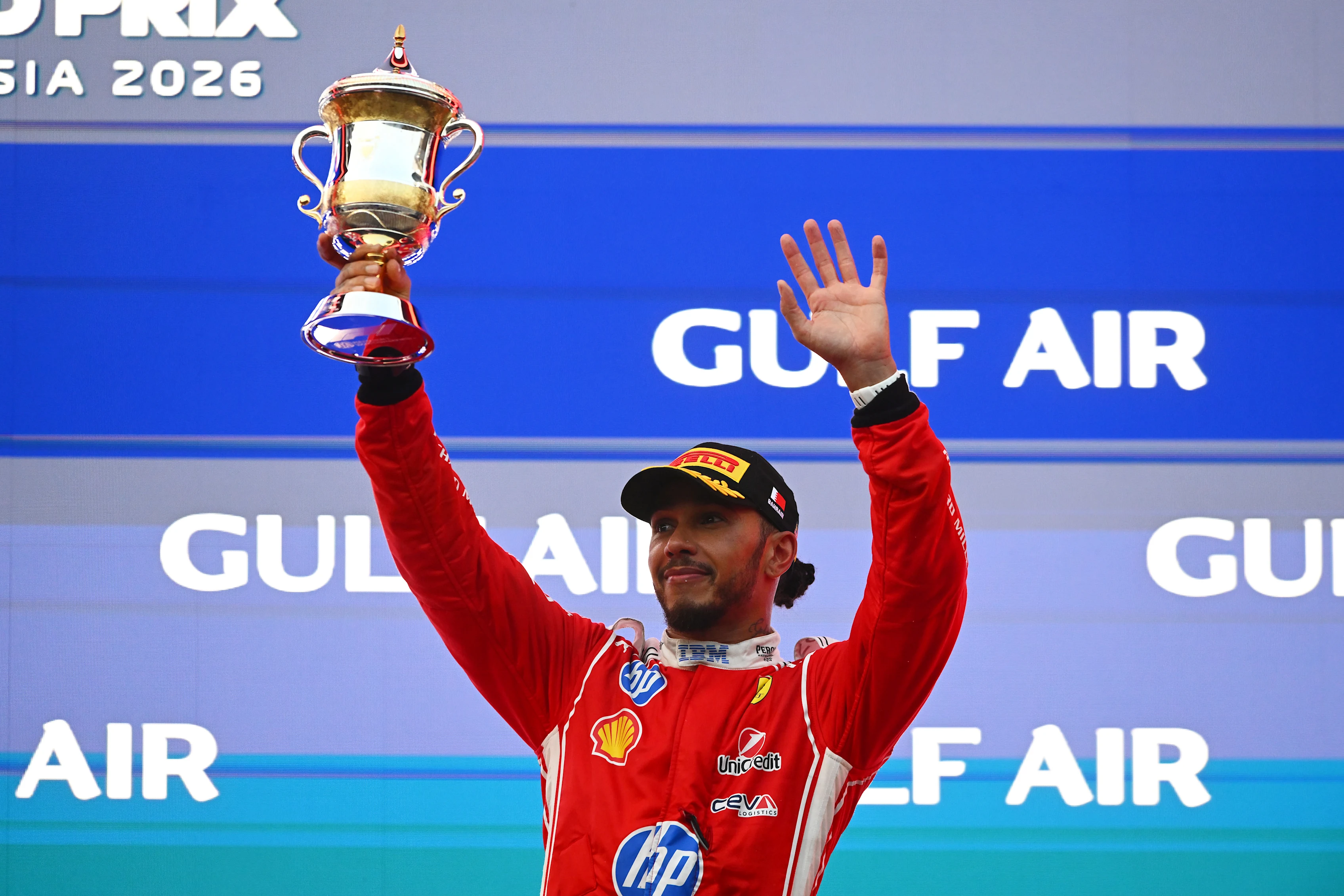 KUALA LUMPUR, MALAYSIA - OCTOBER 04: Third placed Льюис Хэмилтон of Great Britain and Scuderia
