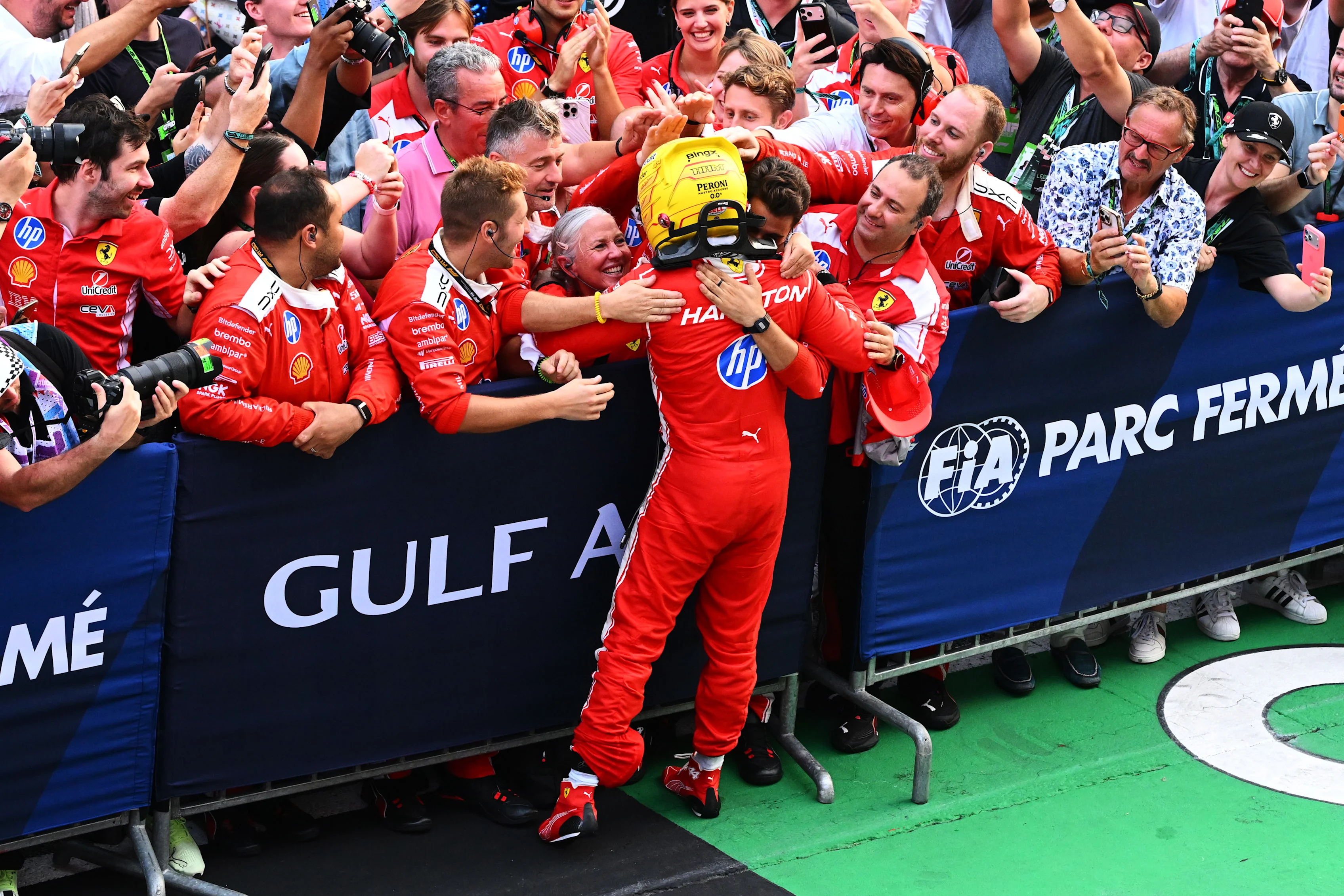 KUALA LUMPUR, MALAYSIA - OCTOBER 04: Third placed Льюис Хэмилтон of Great Britain and Scuderia