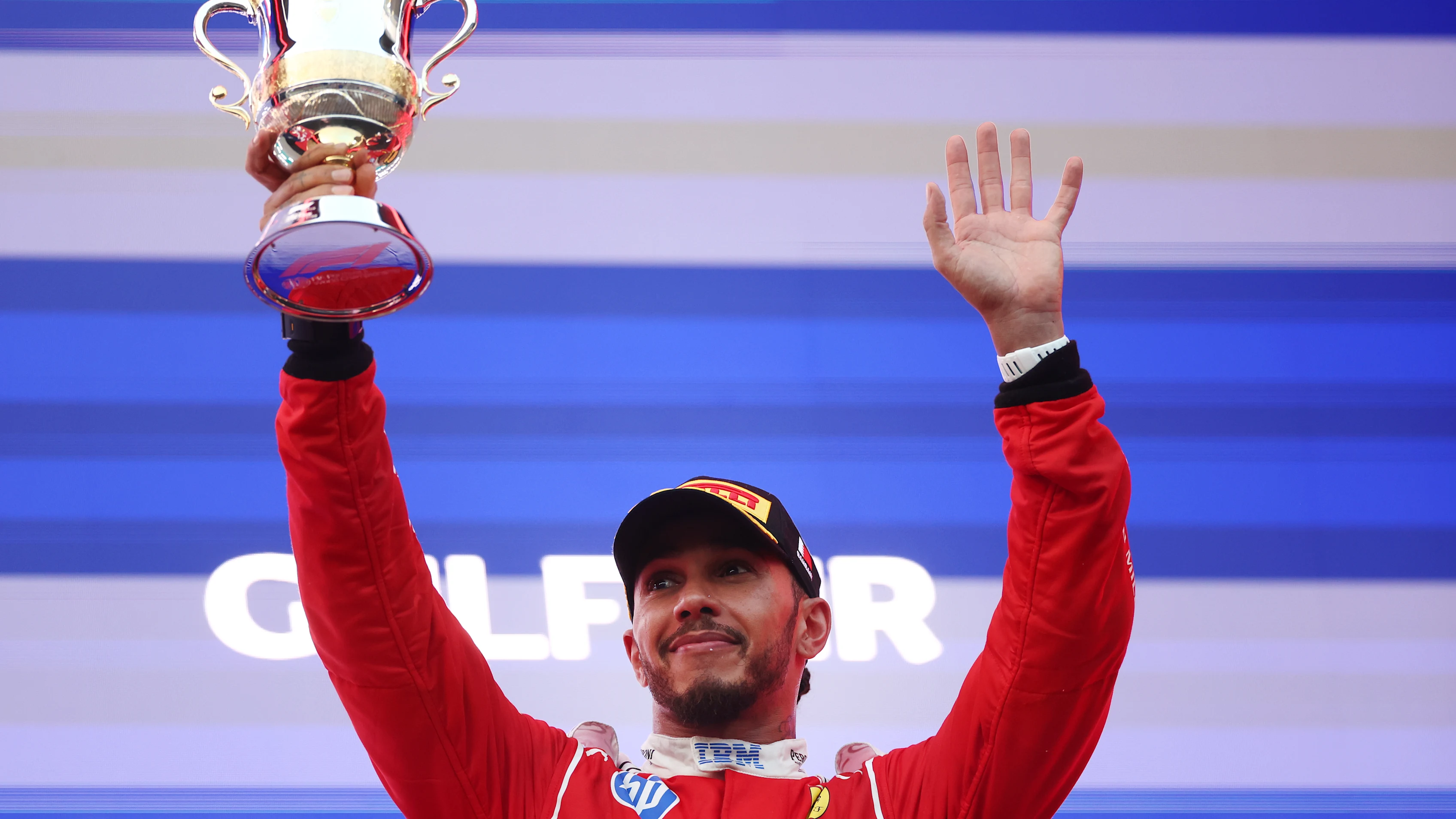 KUALA LUMPUR, MALAYSIA - OCTOBER 04: Third placed Льюис Хэмилтон of Great Britain and Scuderia
