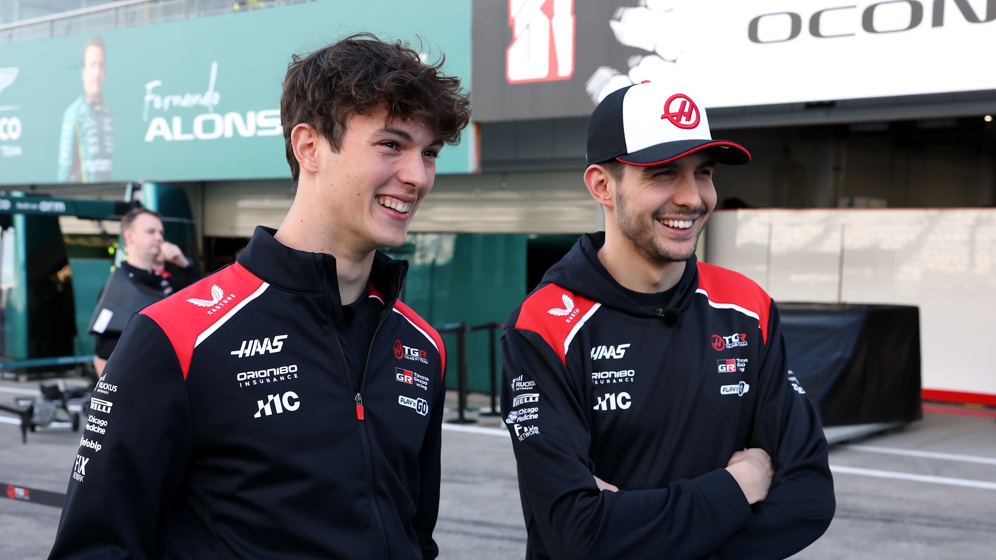 SUZUKA, JAPAN - MARCH 26: Oliver Bearman of Great Britain and Haas F1 and Esteban Ocon of France